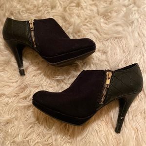 Black and leather zip up heels